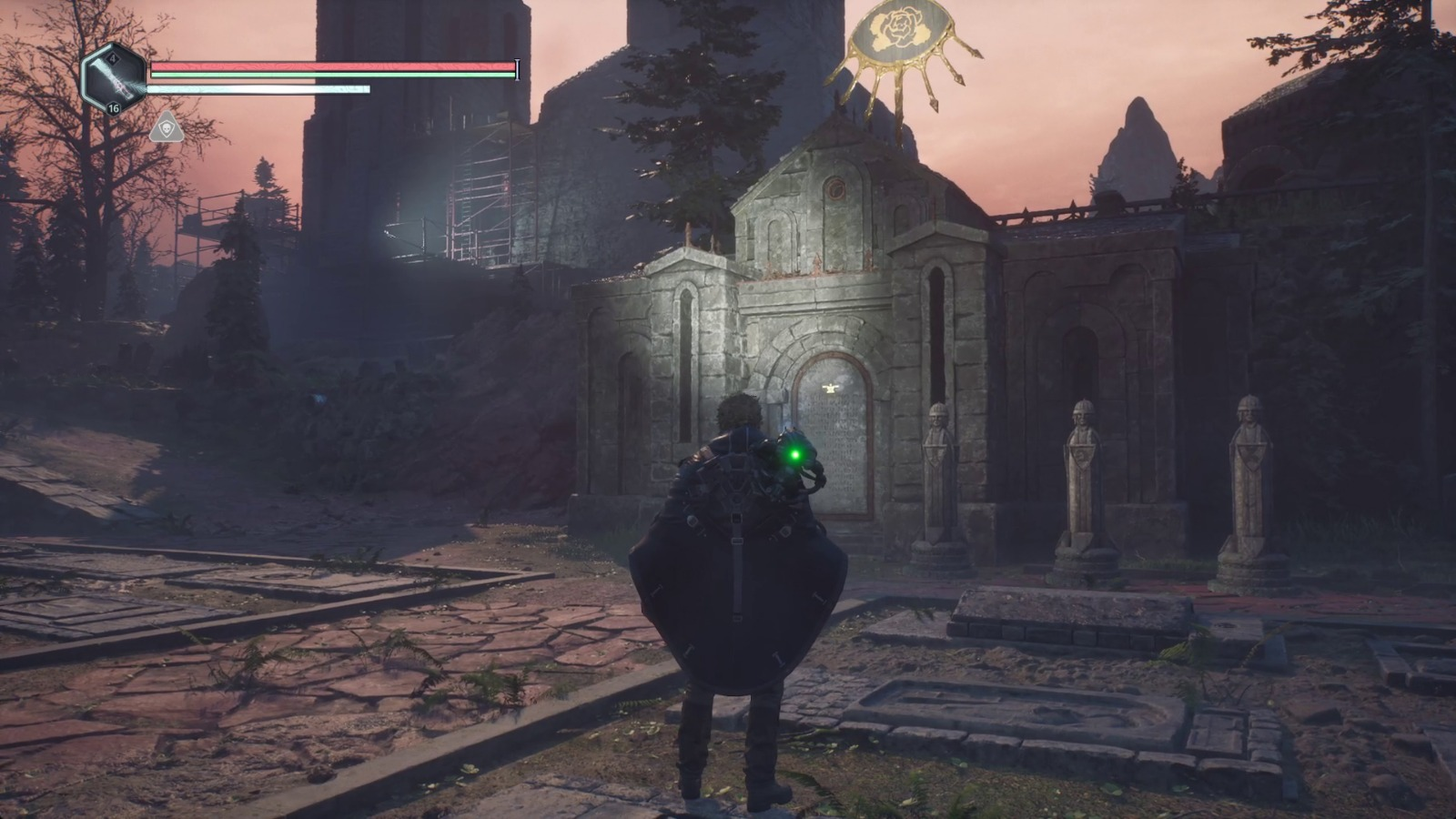 Одна из четырех усыпальниц с символом на крыше