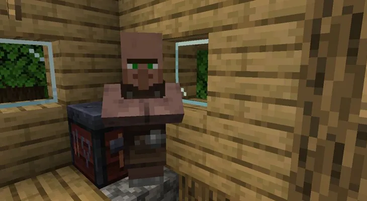 Житель-инструментальщик у кузнечного стола в Minecraft