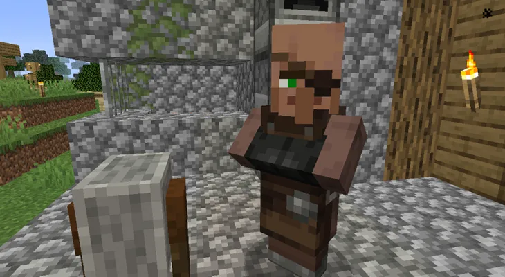 Житель-оружейник у точильного камня в Minecraft
