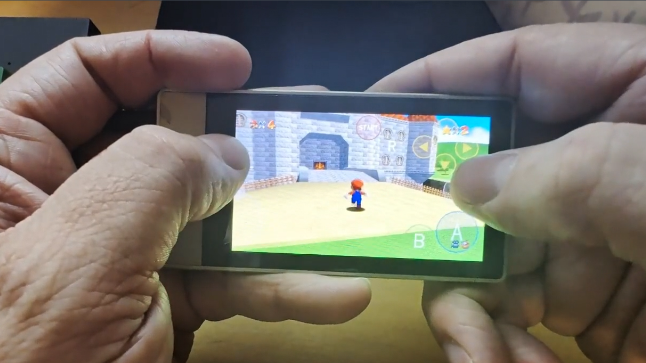 Плеер Microsoft Zune HD, на котором запущена игра Super Mario 64
