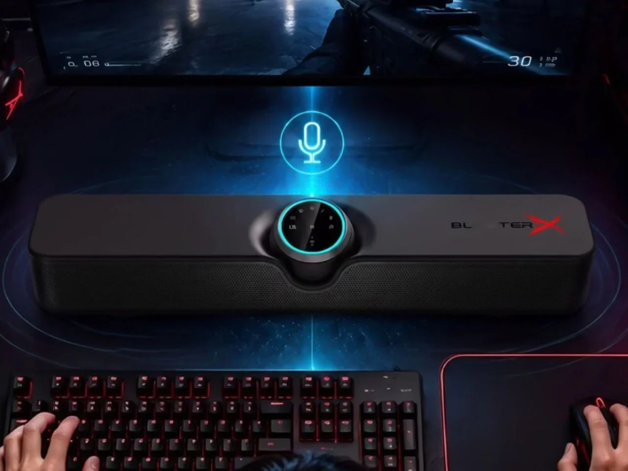 Саундбар Creative B3 с логотипом BlasterX под монитором между клавиатурой и экраном с игрой